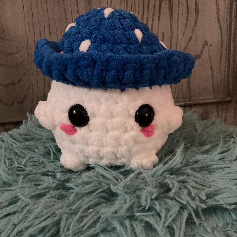Crochet Mushroom that is blue. Cute Plush Toy that is handmade.